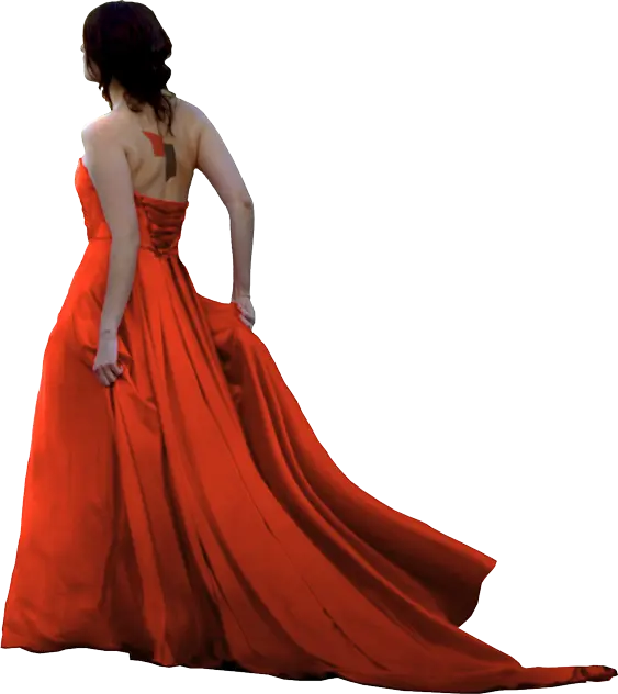 A woman looking up in a orange ball gown
